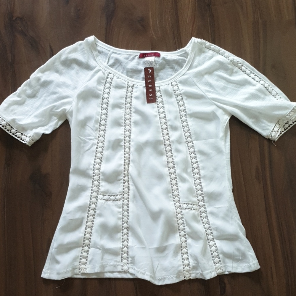 Boutique style blouse with embroidery detail